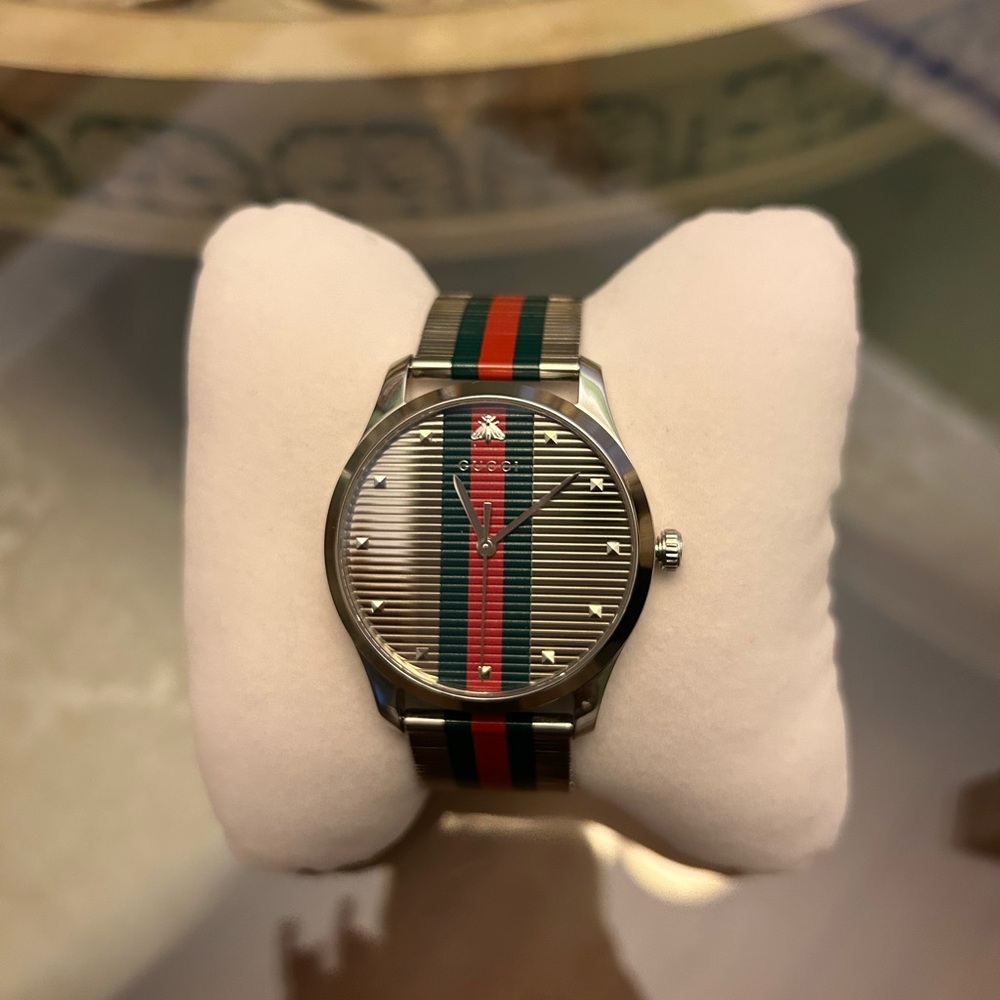 Elegant Authentic Gucci Striped Watch with Green and Red Details